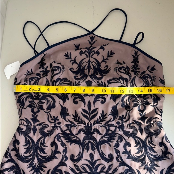 New with tag on BCBGMaxAzria Lilac Mauve Patterned Dress. - Picture 9 of 16